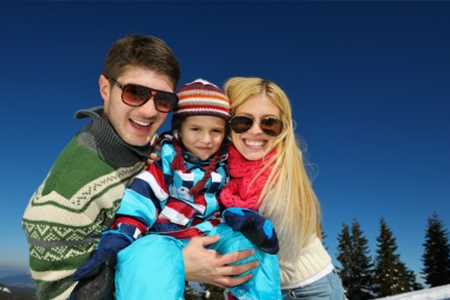 Winter-season.-Happy-family-having-fun-on-fresh-snow-on-vacation.